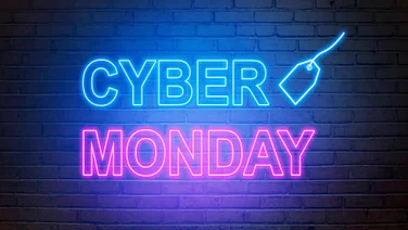 Cyber Monday text from an electric lamp on the wall