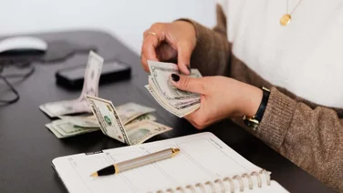 A worker counting money