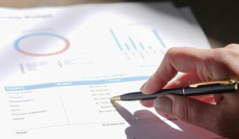 A spreadsheet marked with a pen