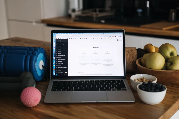 ChatGPT on desktop next to exercise material