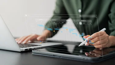 Man using time scheduling software