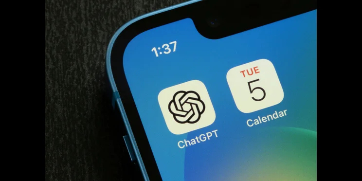ChatGPT and '5' calendar icons in iPhone screen illustrating concept of GPT-5