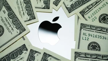 apple logo with money around it