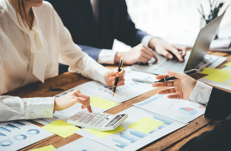 Small business signing loan paperwork