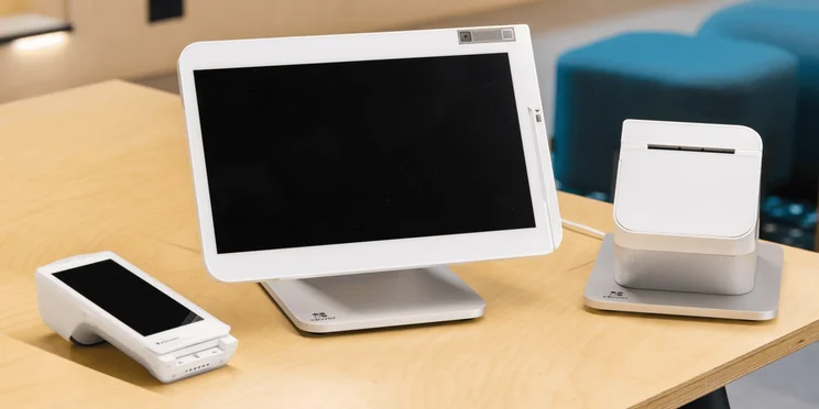 Clover POS system components including terminal, card reader, receipt printer.