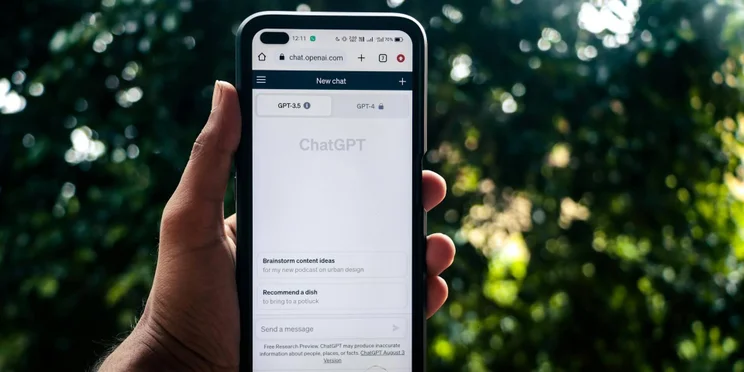 ChatGPT on a phone outside