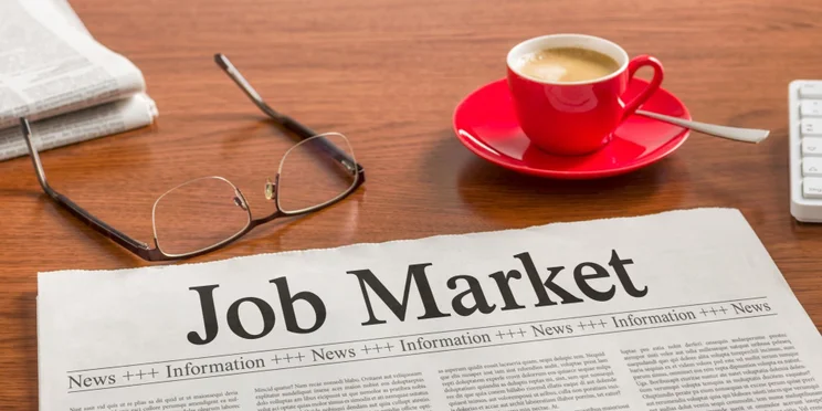 Job Market headline in Newspaper