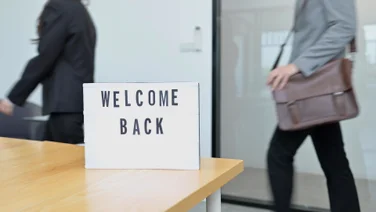 Office workers greeted by 'Welcome Back' sign