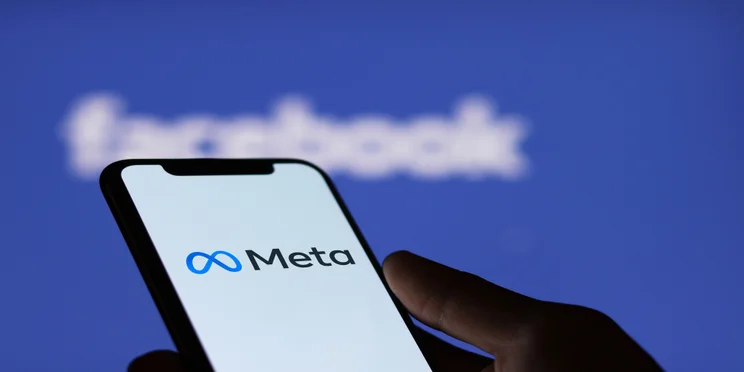 Phone with Meta logo displayed on the screen