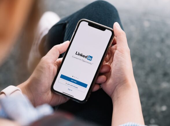 Person using LinkedIn on phone
