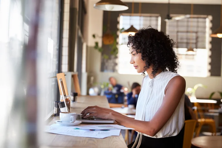 Woman working in a cafe