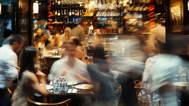 Blurred motion image of crowded bar