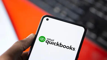 QuickBooks logo on phone screen