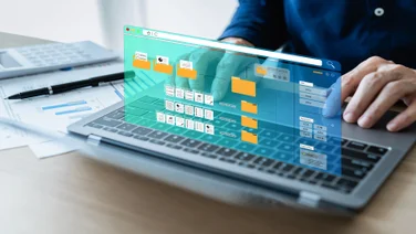 Person on laptop using project management software
