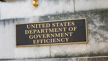 DOGE plaque outside building