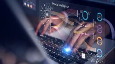 AI used while typing on a laptop