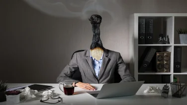 Person with burnt out match for head