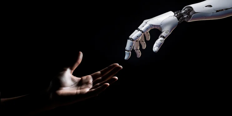Robot hand reaching for human hand