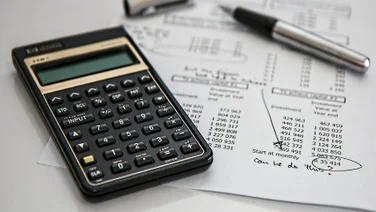 A calculator and accounting papers
