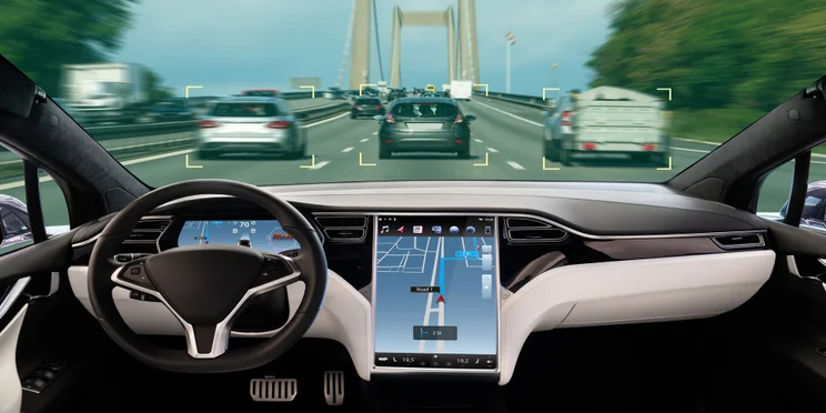 Inside view of self-driving vehicle on road