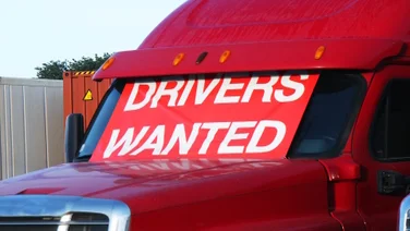 Drivers wanted sign in truck window