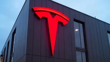 Tesla logo in red on building