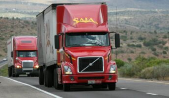 Two red trucks