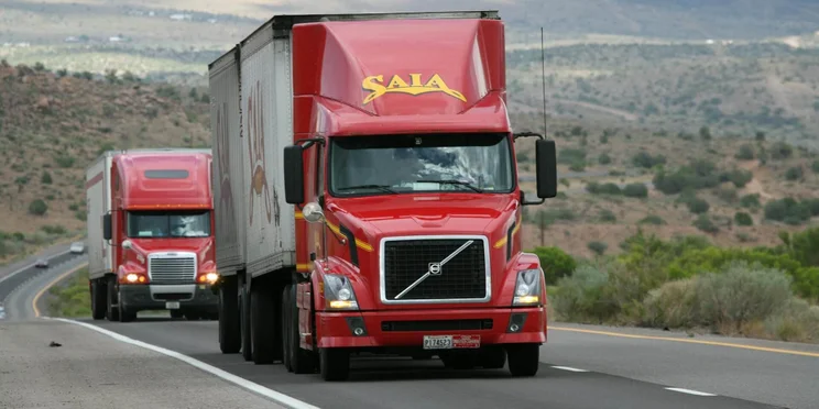 Two red trucks