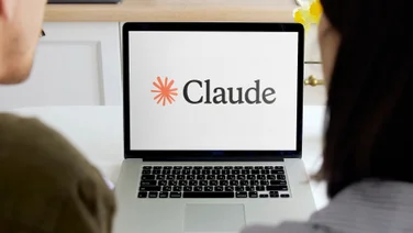 Claude AI on laptop being looked