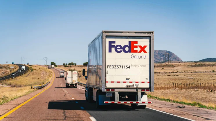 FedEx truck on a road