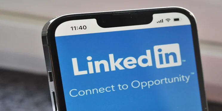 Phone with LinkedIn on screen