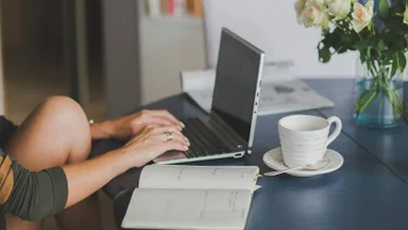 Person on laptop working online