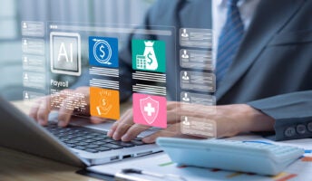 Person working at laptop, using AI tools