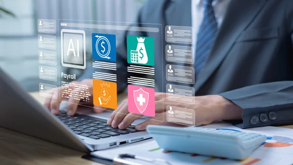 Person working at laptop, using AI tools