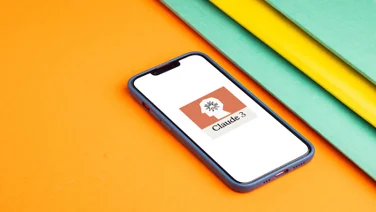 Phone with Claude on screen
