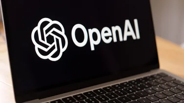 OpenAI logo on laptop