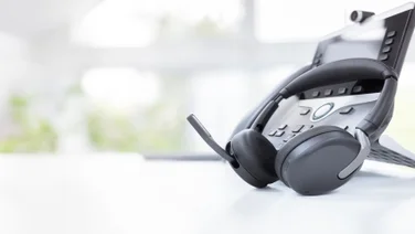 Headset and deskphone on desk