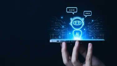 Hand holding phone with AI agent projected up