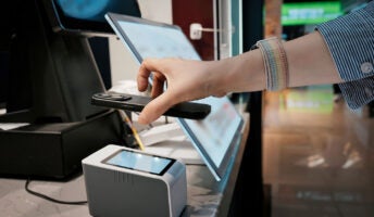 Person paying for something with phone