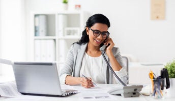 Woman on phone making business call