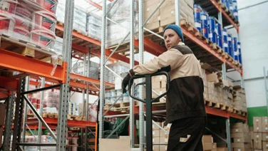 Warehouse worker with boxes