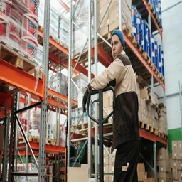 Warehouse worker with boxes