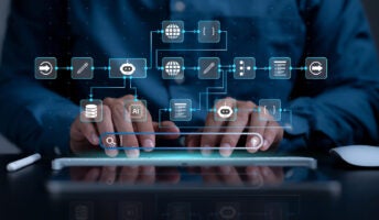 Person typing on iPad