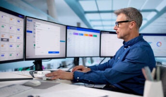 Man working on CRM dashboard