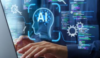 individual on laptop coding with AI