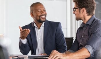 Business men discussing issue in boardroom