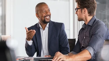 Business men discussing issue in boardroom