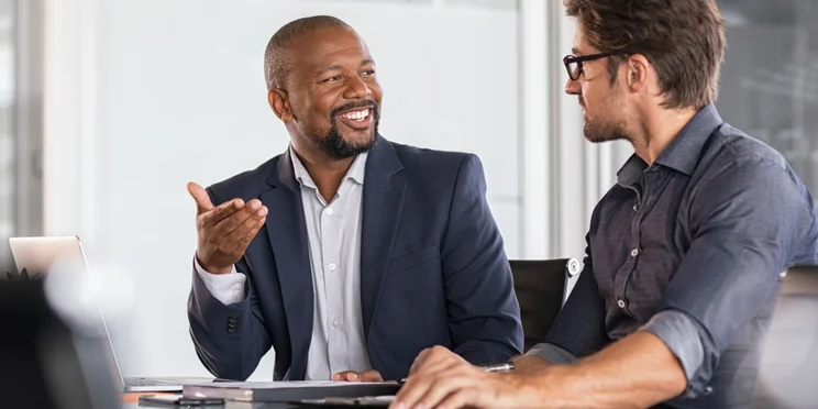 Business men discussing issue in boardroom