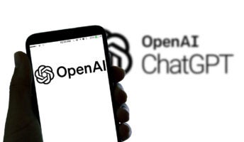 OpenAI logo on phone screen