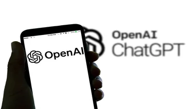 OpenAI logo on phone screen